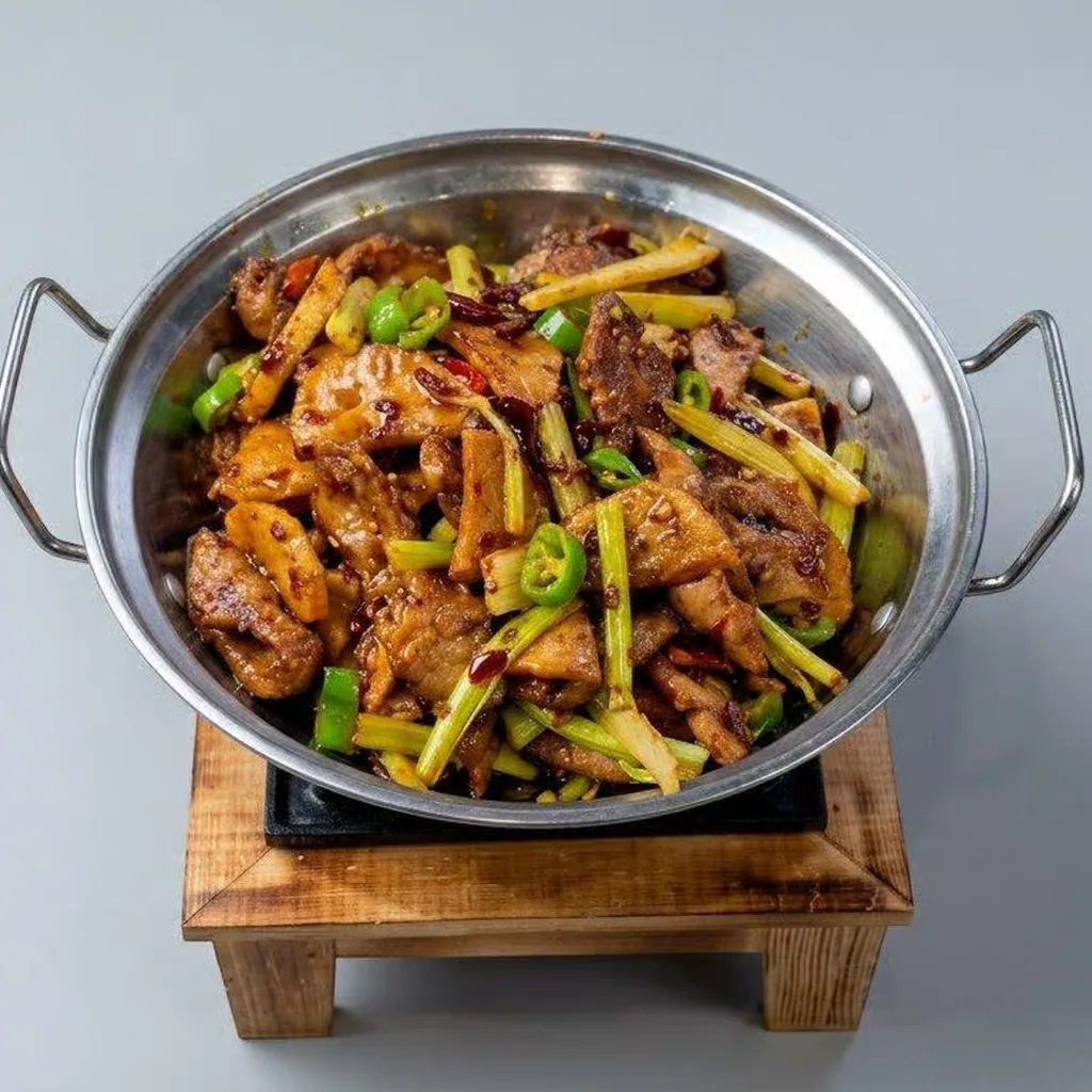 Sichuan dry pot pork intestines with celery and chillies at Lucky Cat in London, Ontario